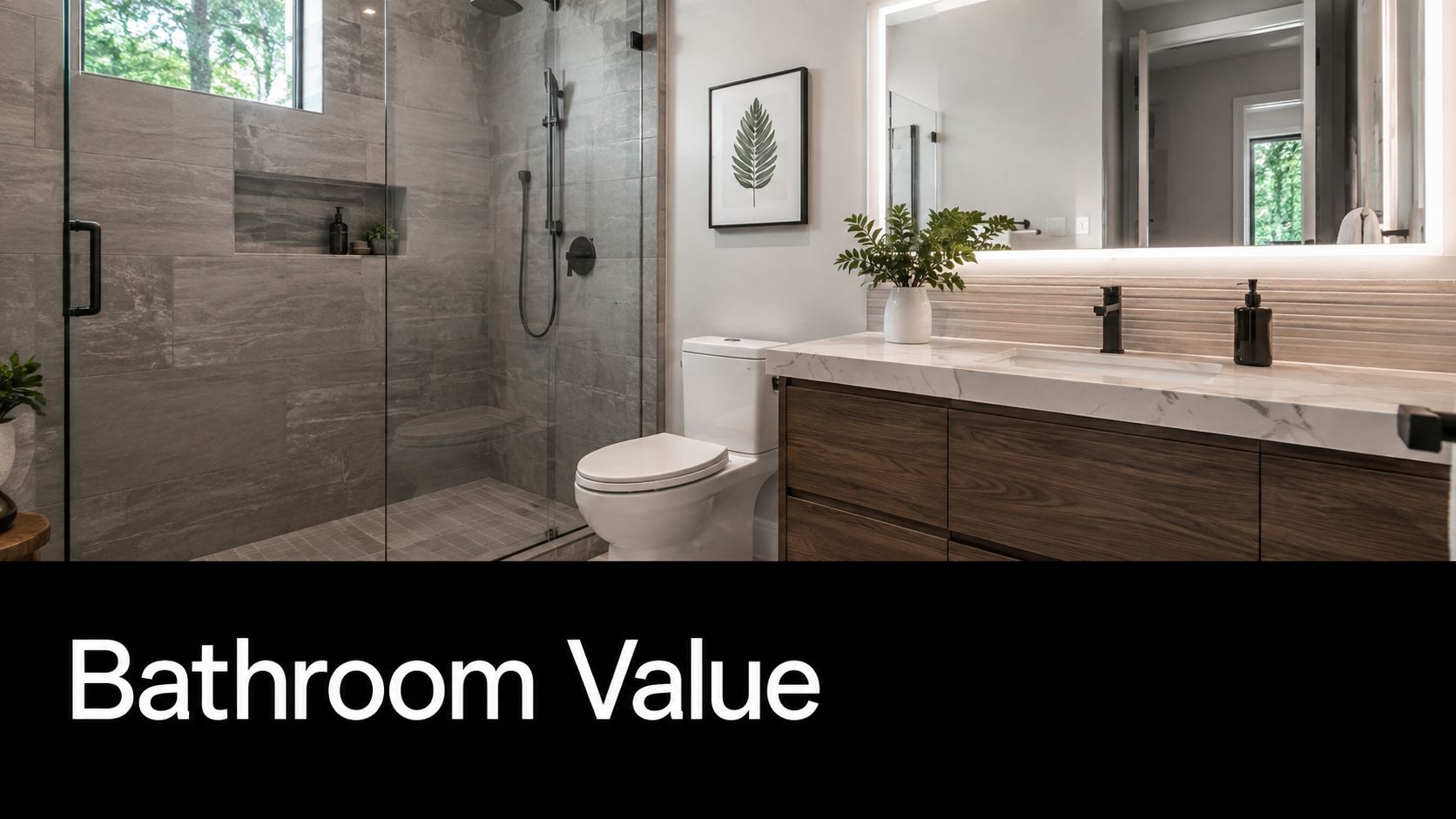 A modern bathroom featuring gray stone shower tiles, a wooden vanity, and a backlit wall mirror.